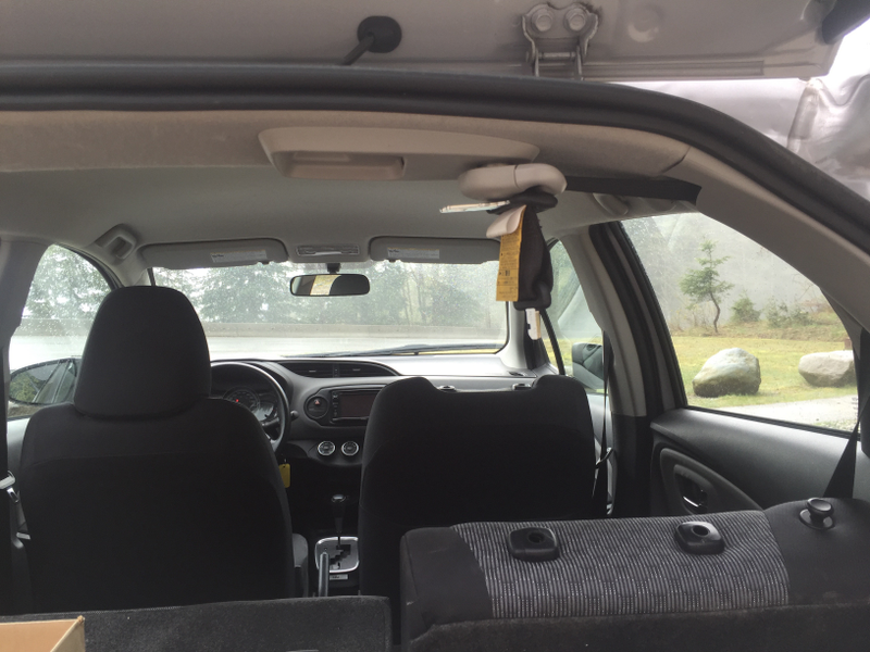 Wtf is this shit. Just hanging there, loudly flapping in the wind if I ever drive with the windows down. Lazy, Toyota, lazy.....